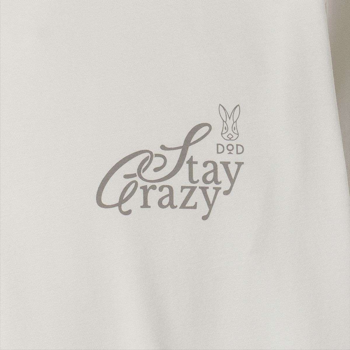 디오디(DOD) 레터링 그래픽 긴팔티셔츠(IVORY)
