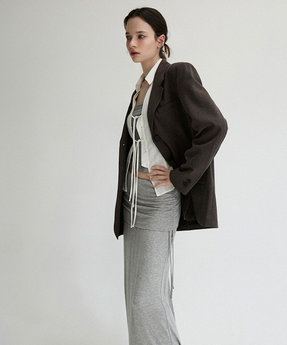 미쏘(MIXXO) 폴디드 밴딩 셔링 스커트_MIWWMG916C
