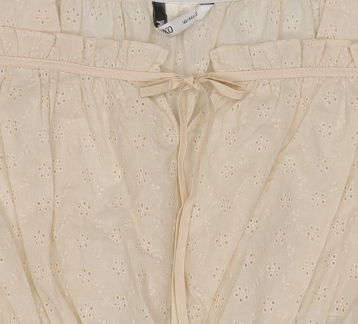 미쏘(MIXXO) 아일렛 허리벤딩 크롭 블라우스 MIWBWB752G S
