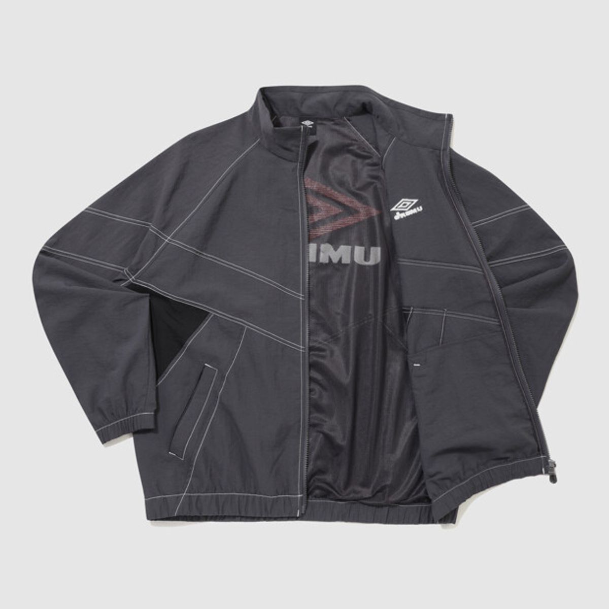 엄브로(UMBRO) 크리스피 타슬란 긴팔 자켓 챠콜 UR324CJK91