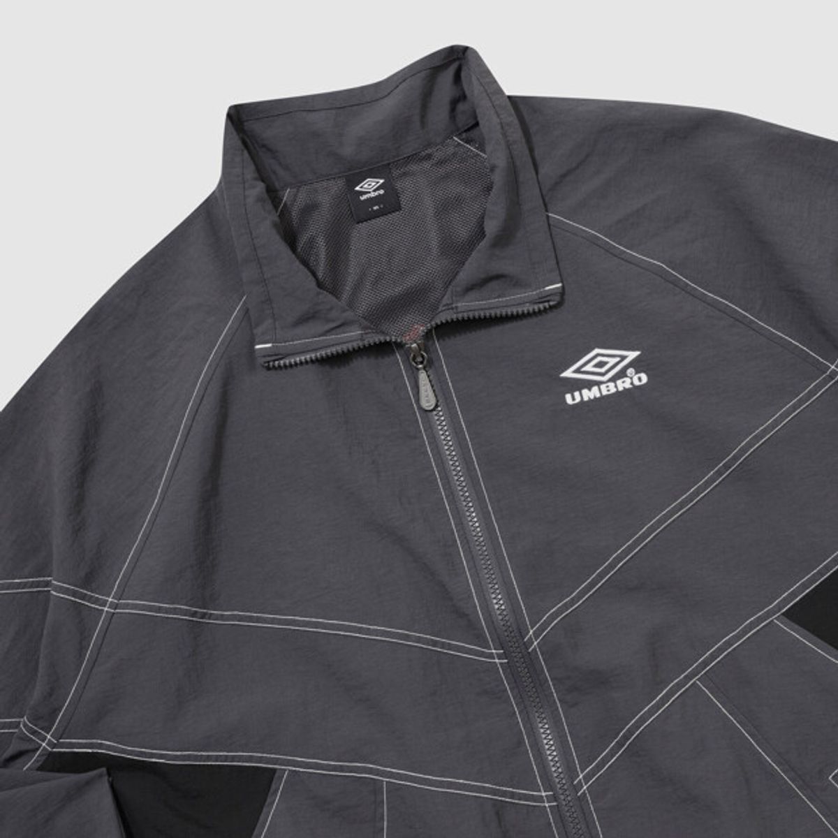 엄브로(UMBRO) 크리스피 타슬란 긴팔 자켓 챠콜 UR324CJK91