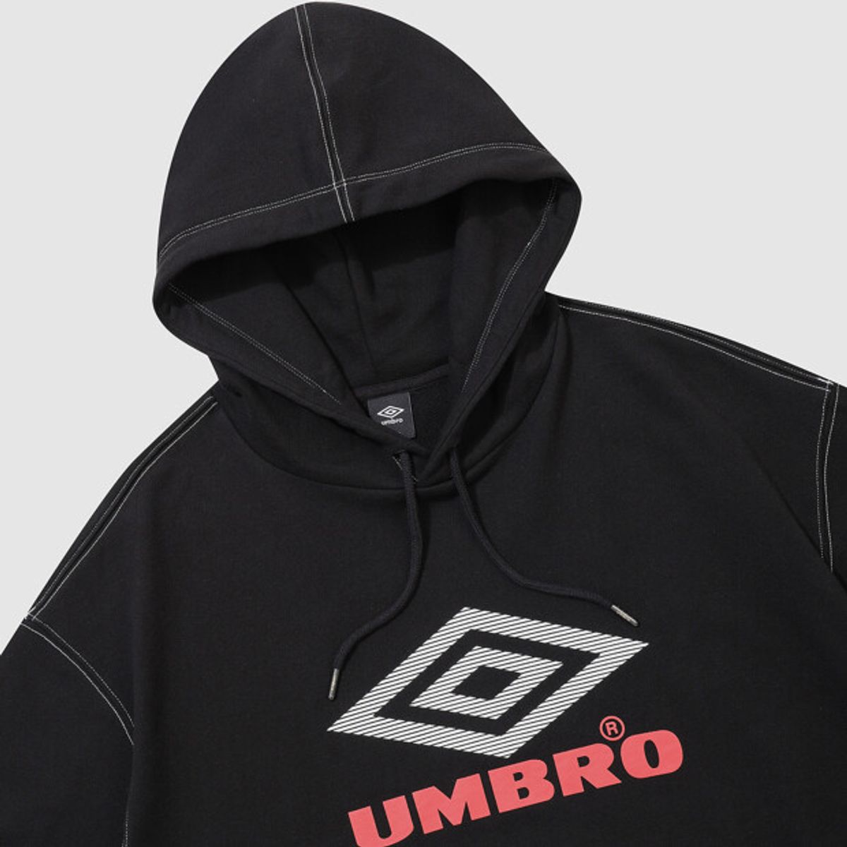 엄브로(UMBRO) 크리스피 타슬란 솔리드 후드 티셔츠 블랙 UR321CHD96
