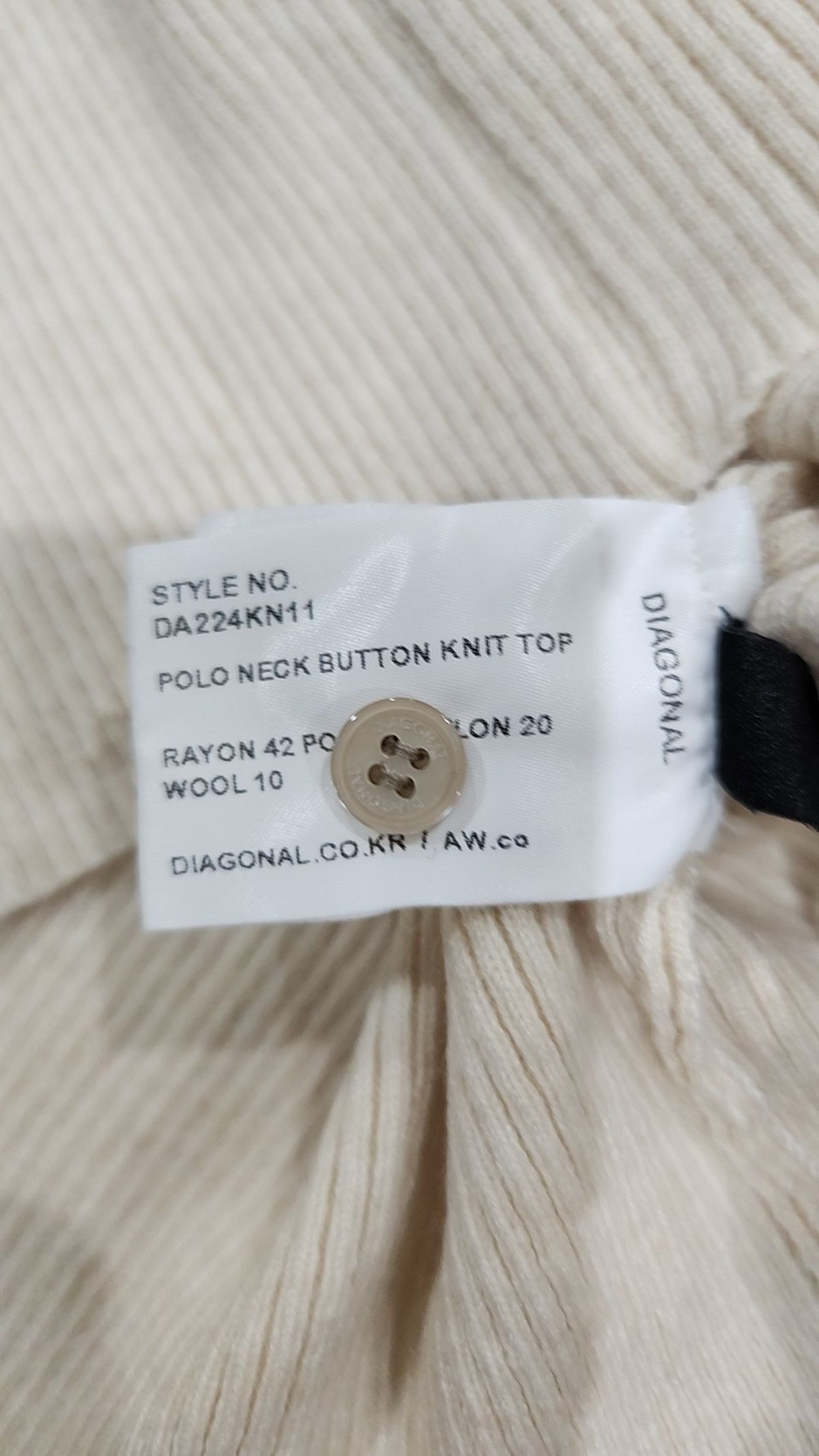 다이애그널(DIAGONAL) POLO NECK BUTTON KNIT TOP (ivory)