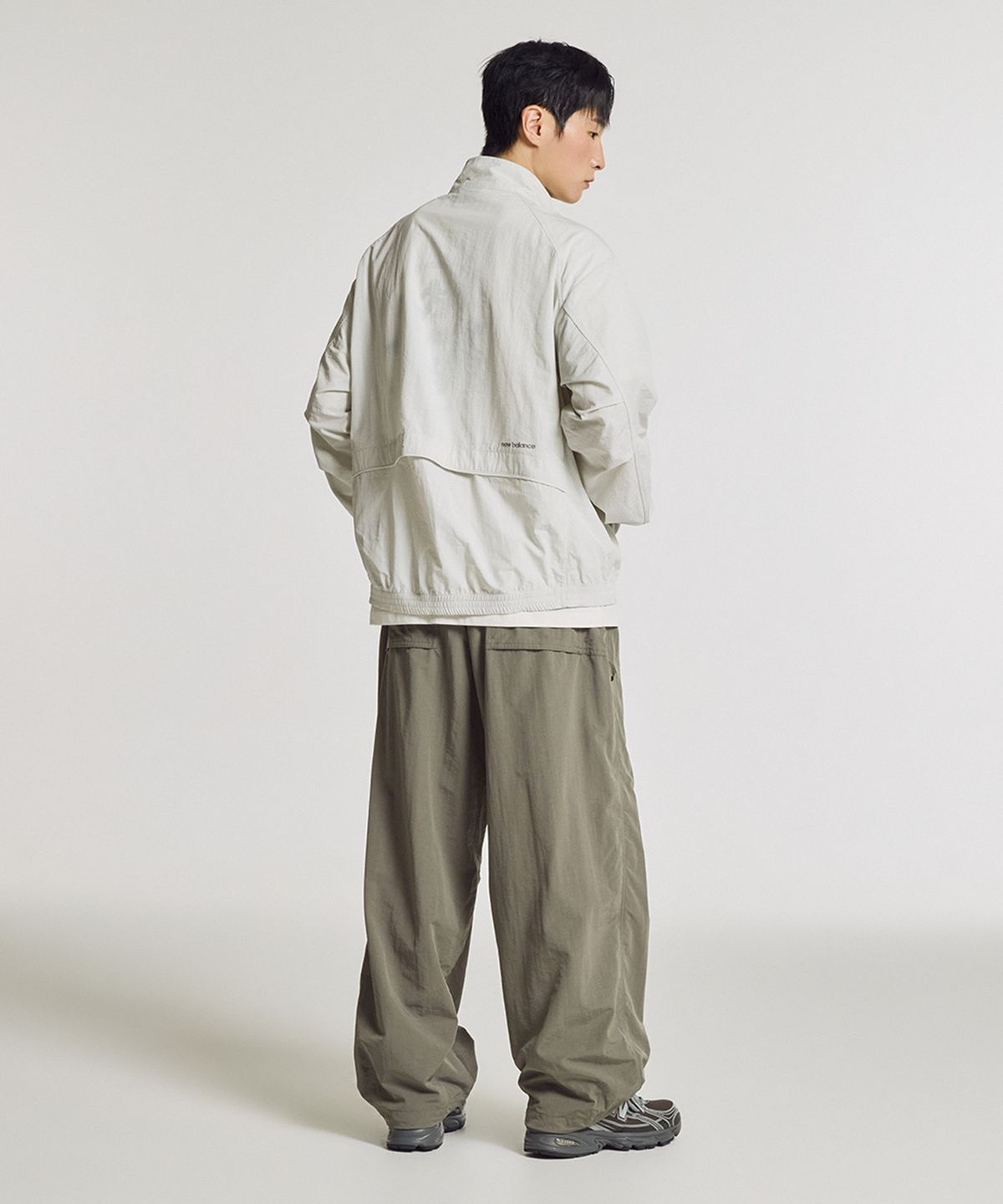 뉴발란스(NEW BALANCE) NBNTG31803 / UNI 에센셜 헤리티지 2WAY 우븐 와이드 팬츠 (G/KHAKI)