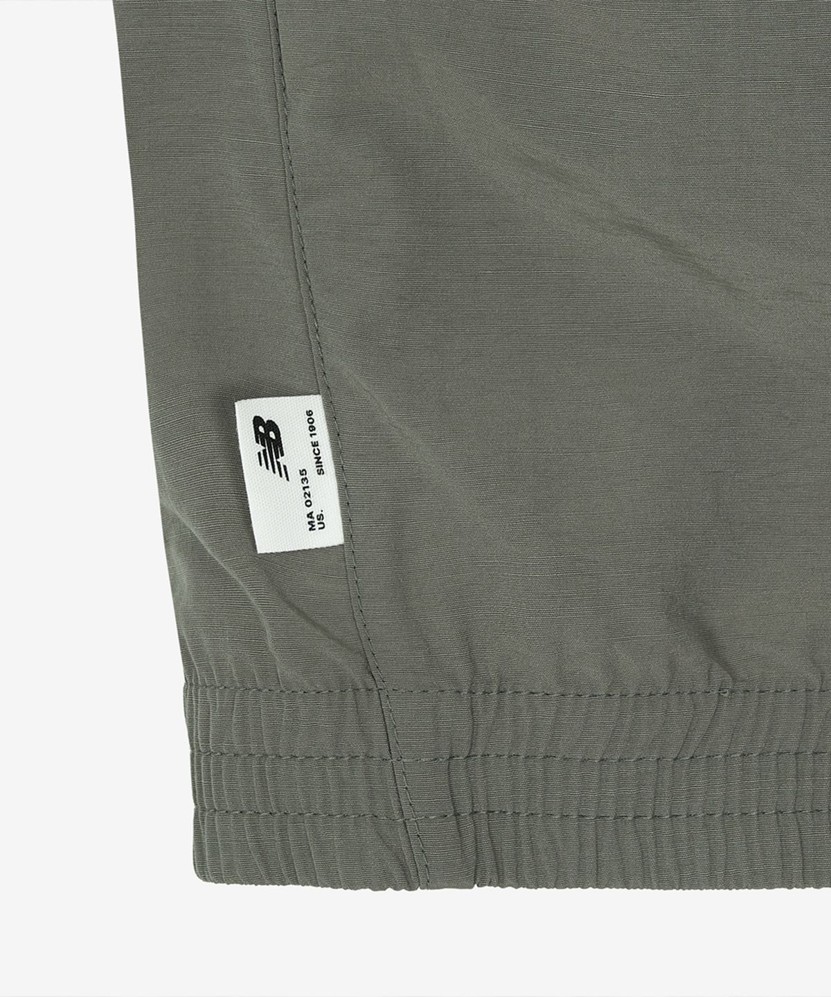 뉴발란스(NEW BALANCE) NBNAG31803 / UNI 에센셜 헤리티지 스탠드넥 웜업자켓 (G/KHAKI)