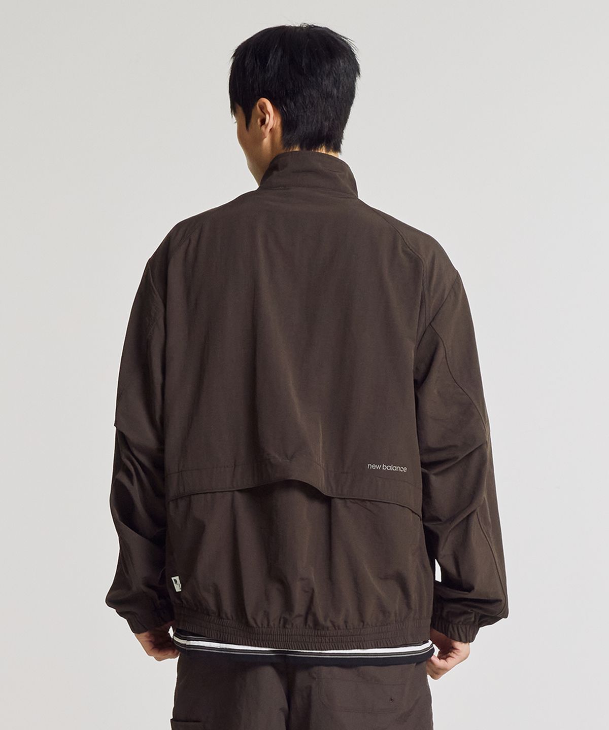 뉴발란스(NEW BALANCE) NBNAG31803 / UNI 에센셜 헤리티지 스탠드넥 웜업자켓 (BROWN)