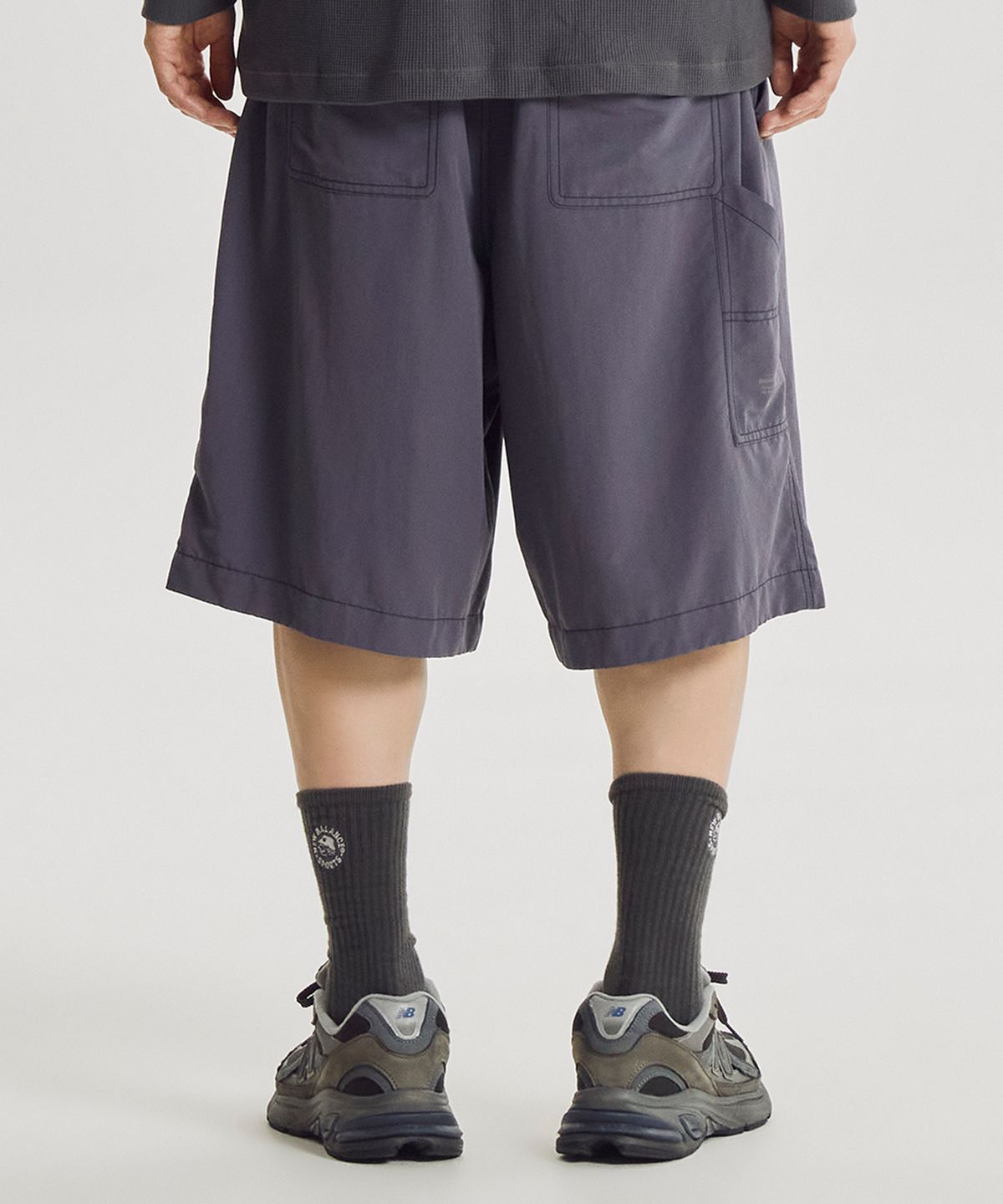 뉴발란스(NEW BALANCE) NBNVG31833 / UNI ESCAPE 6부 우븐 쇼츠 (PURPLE)