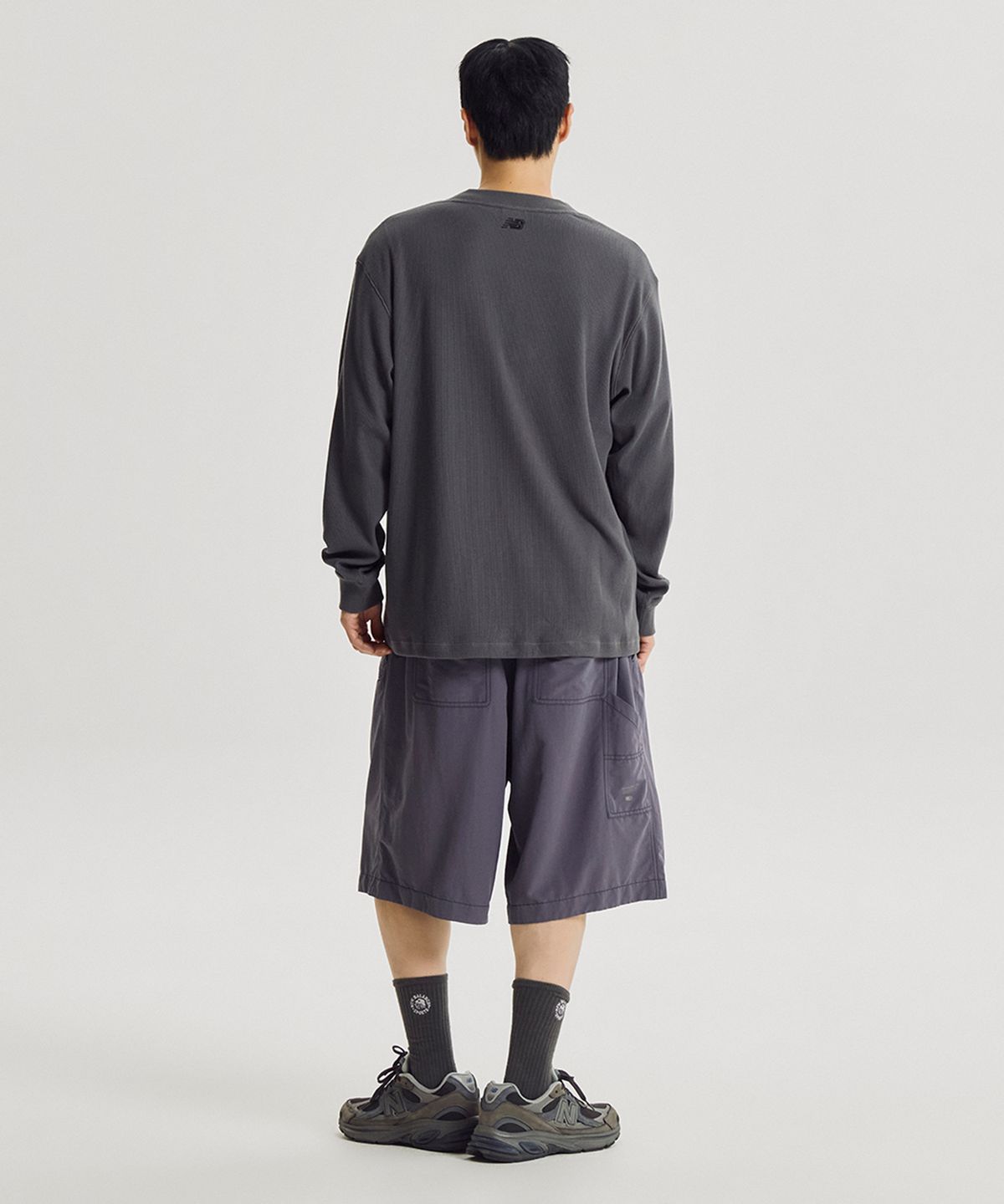 뉴발란스(NEW BALANCE) NBNVG31833 / UNI ESCAPE 6부 우븐 쇼츠 (PURPLE)