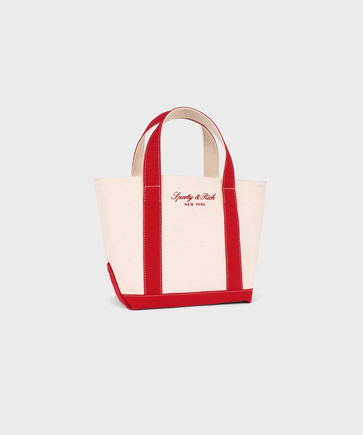 스포티앤리치(SPORTY&RICH) 시그니처 NY 로고 미니 토트백 - 내추럴/레드 R265AOB008