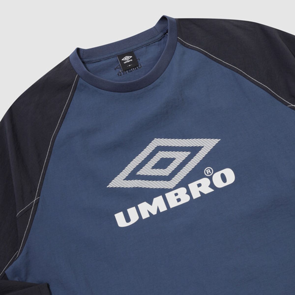 엄브로(UMBRO) 크리스피 타슬란 긴팔 피스테 네이비 UR324CWT92
