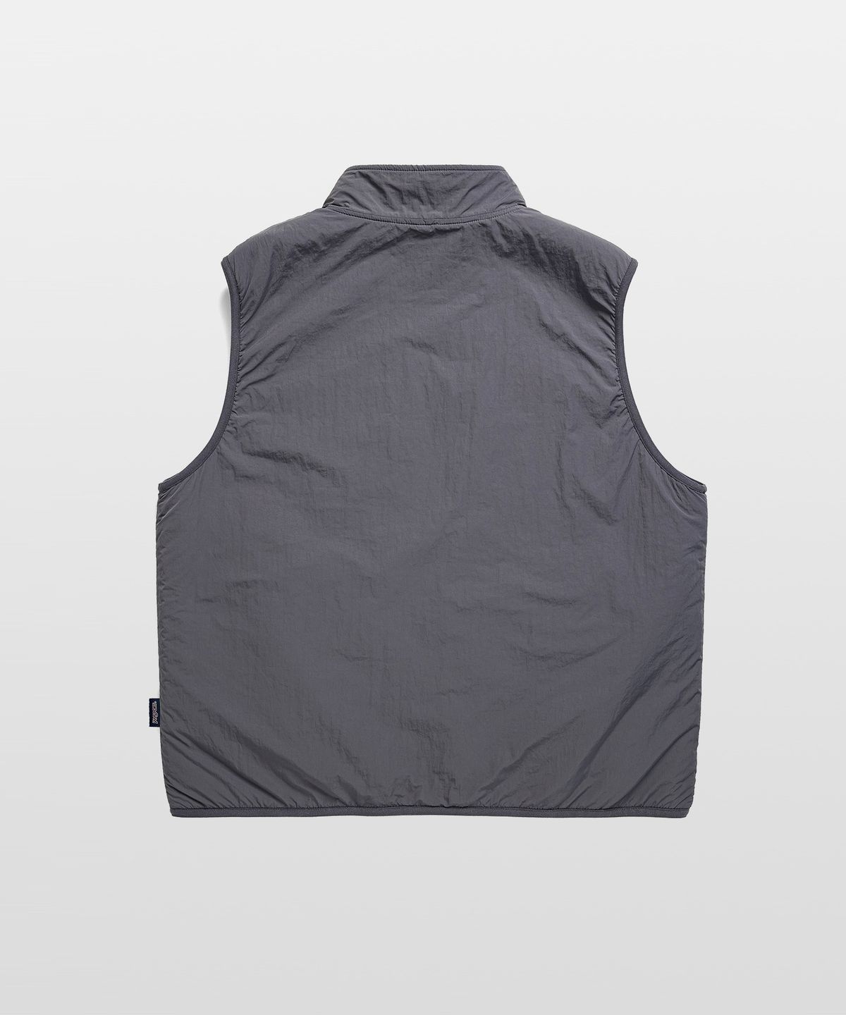잔스포츠(JANSPORT) 로고 패턴 플리스 리버서블 베스트 IVORY