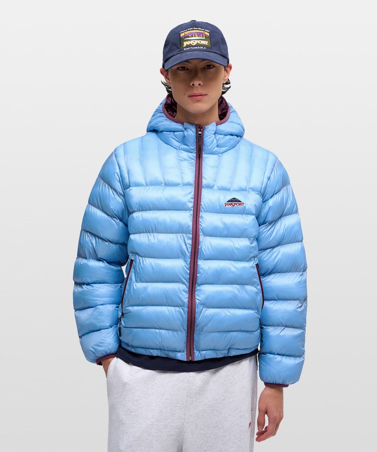 잔스포츠(JANSPORT) 베이직 로고 경량 패딩 SKY BLUE