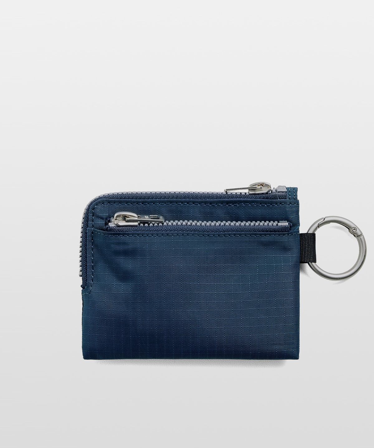 잔스포츠(JANSPORT) 베이직 로고 파우치 키링 NAVY