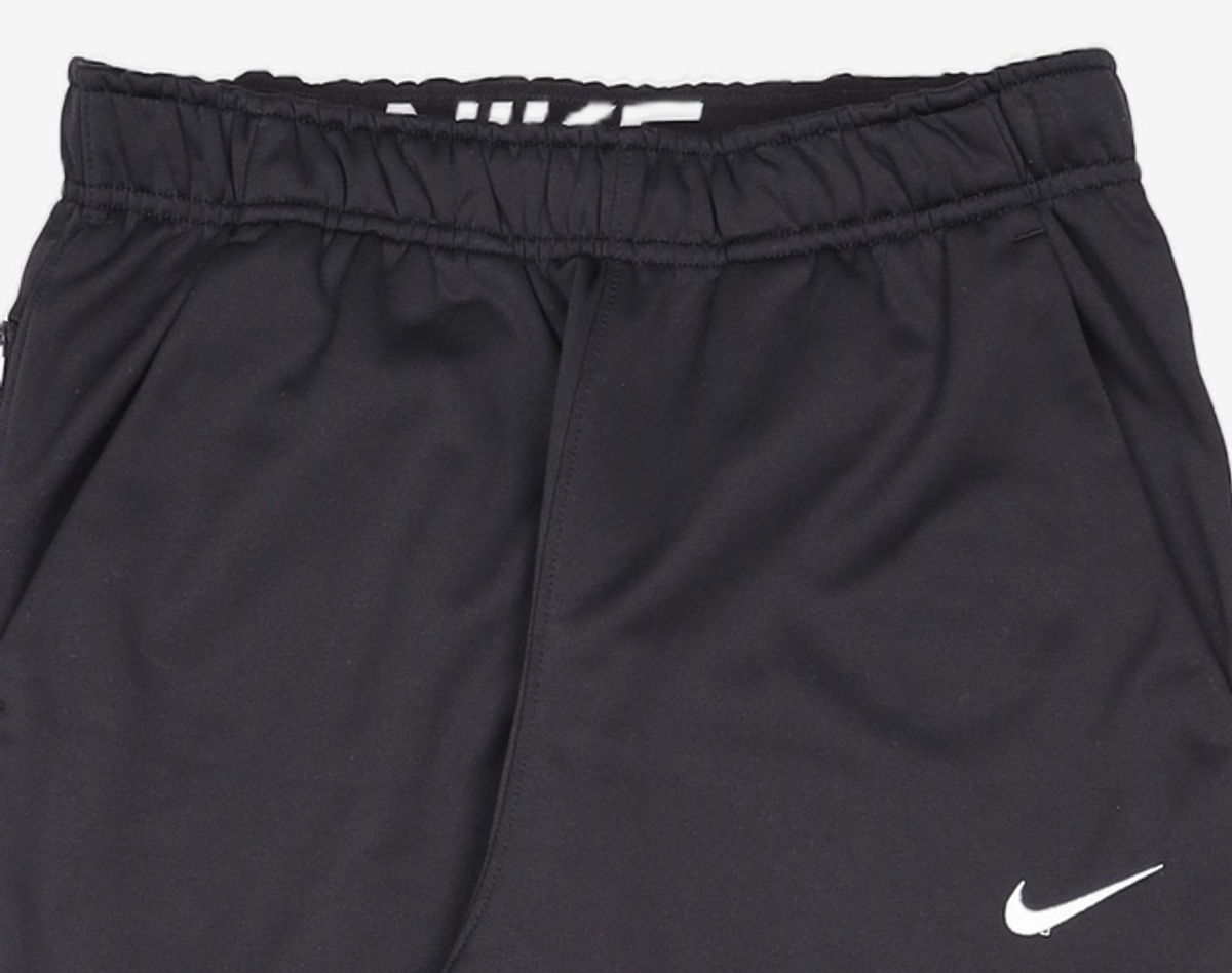 나이키(NIKE) 써마 핏 테이퍼드 트레이닝 팬츠 M - 블랙:화이트 / DQ5406-010 M
