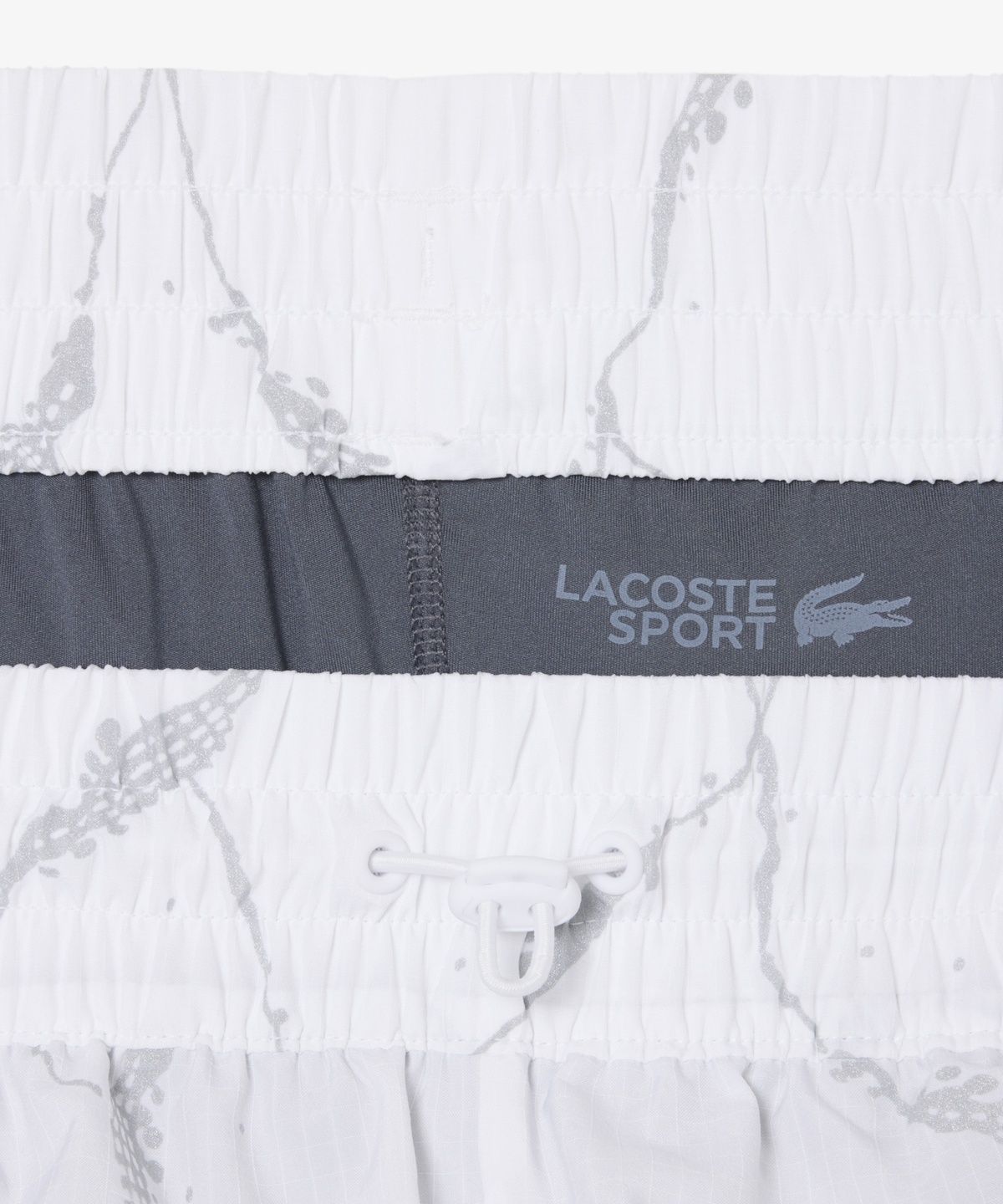 라코스테(LACOSTE) 여성 테니스 패턴 쇼츠 GF6845-56N Z13
