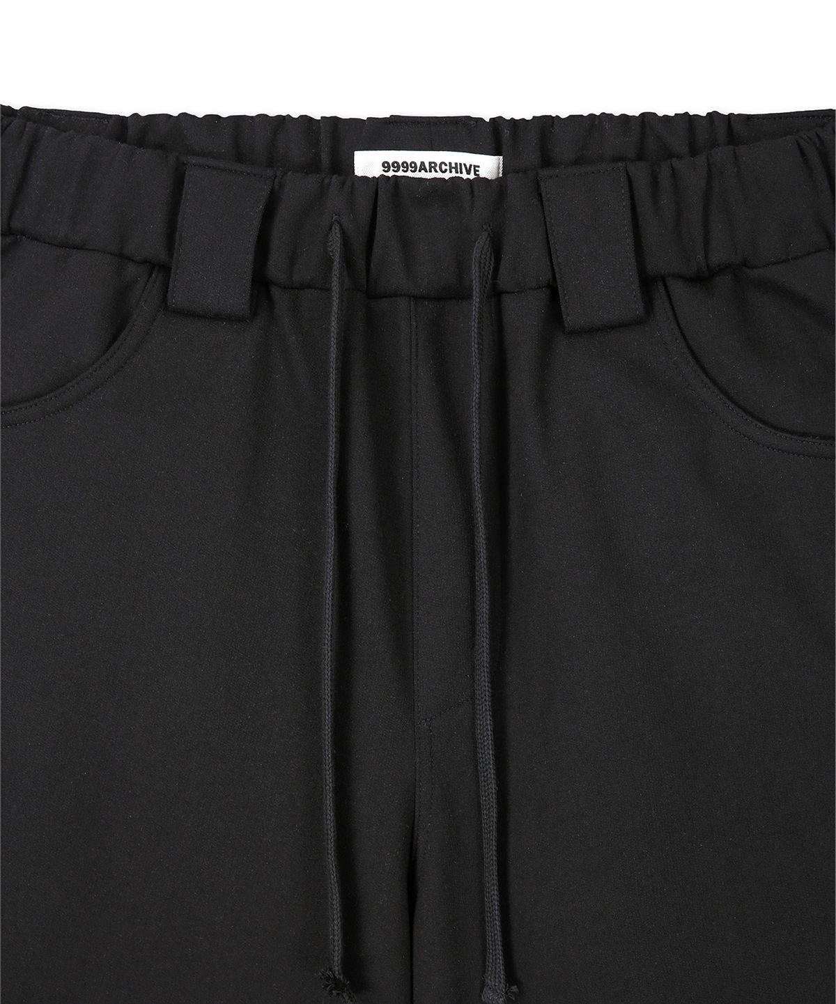 9999아카이브(9999ARCHIVE) Technical Curved Sweat Pants