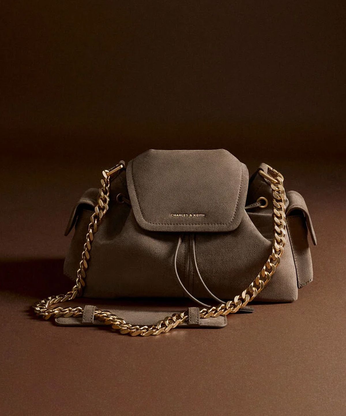 찰스앤키스(CHARLES & KEITH) 노앤 사이드 포켓 버킷백 CK2-10160273-1