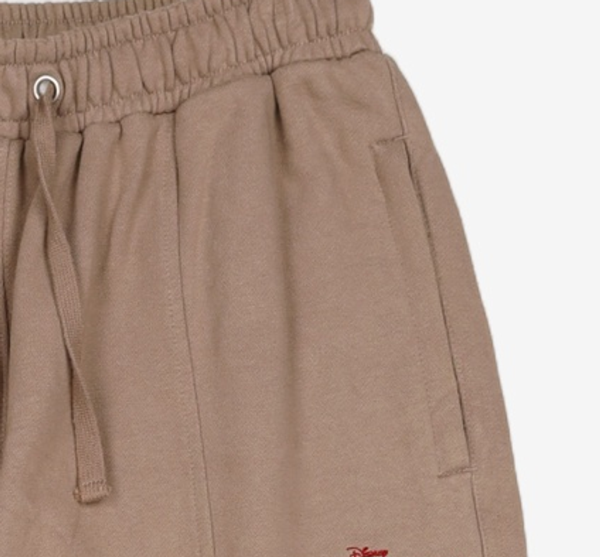 메종미네드(MAISON MINED) (THE LION KING)SMALL LOGO JOGGER PANTS DUSTY BEIGE 50