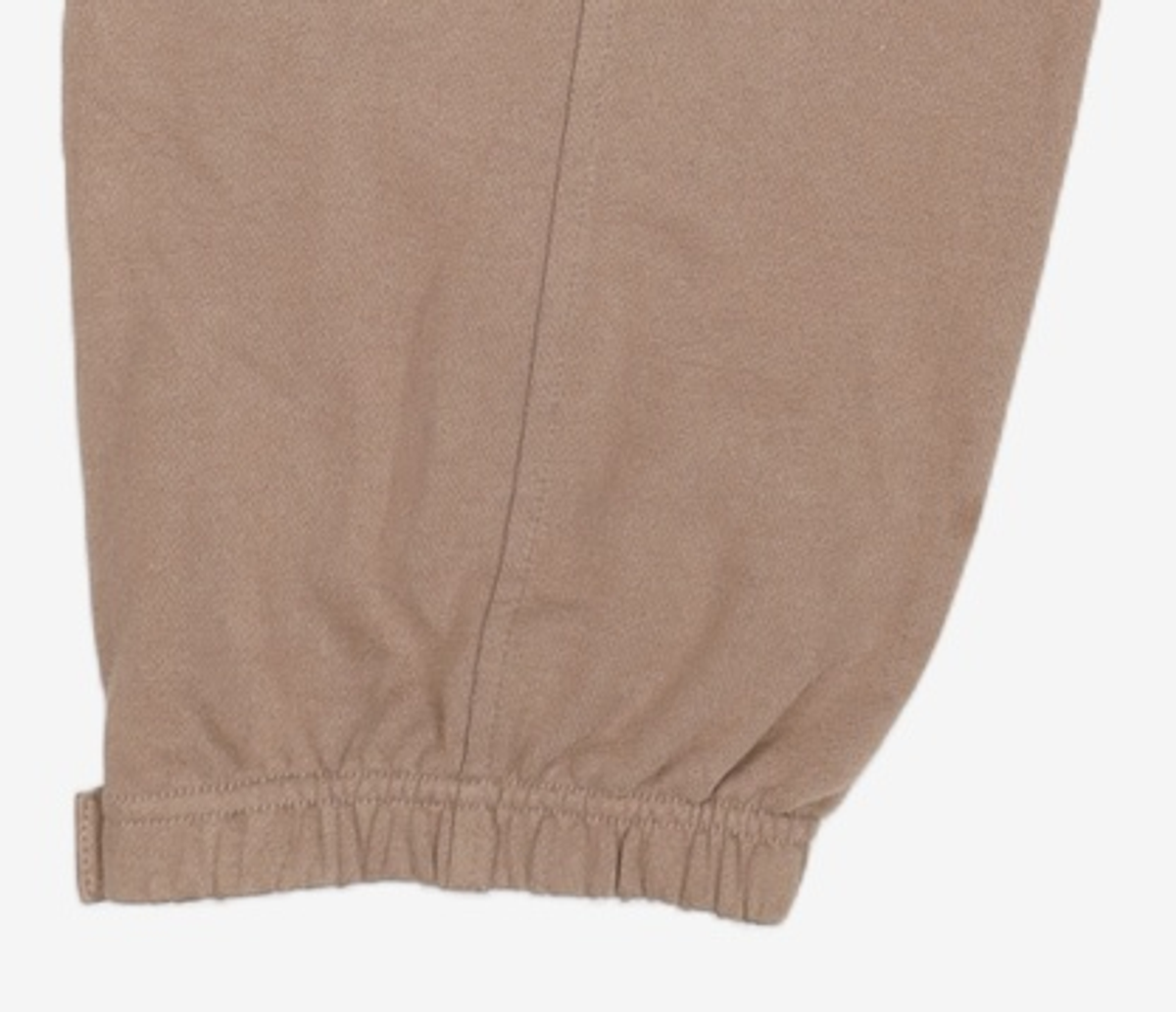 메종미네드(MAISON MINED) (THE LION KING)SMALL LOGO JOGGER PANTS DUSTY BEIGE 50