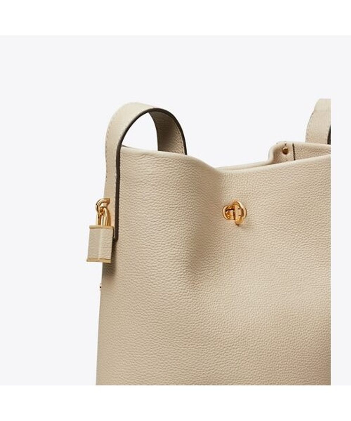 토리버치(TORYBURCH) 락 슬림 미디엄 버킷백 - 라이트 스톤