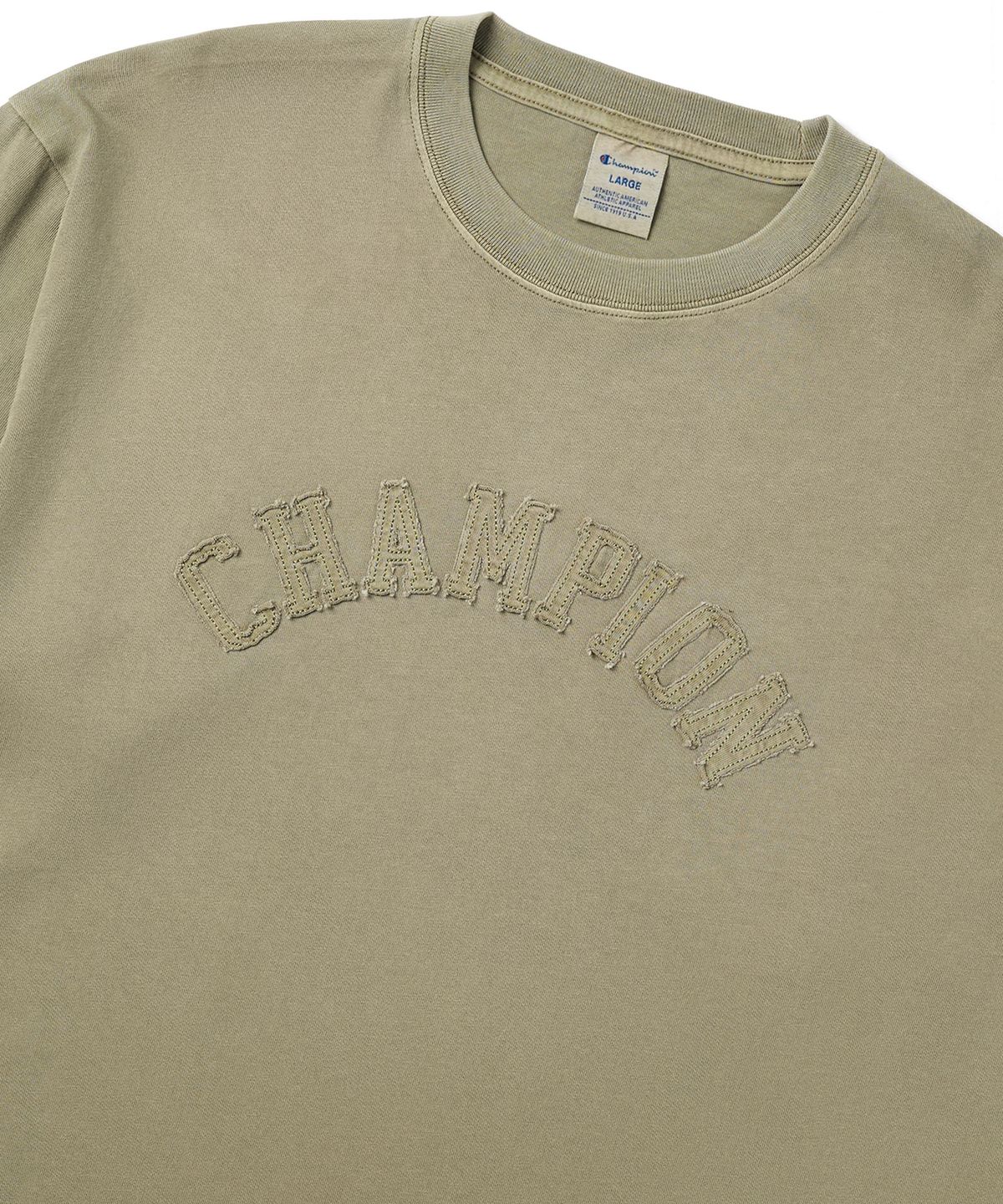 챔피온(CHAMPION) 아치 로고 루즈핏 아플리케 롱슬리브 티셔츠 Beige