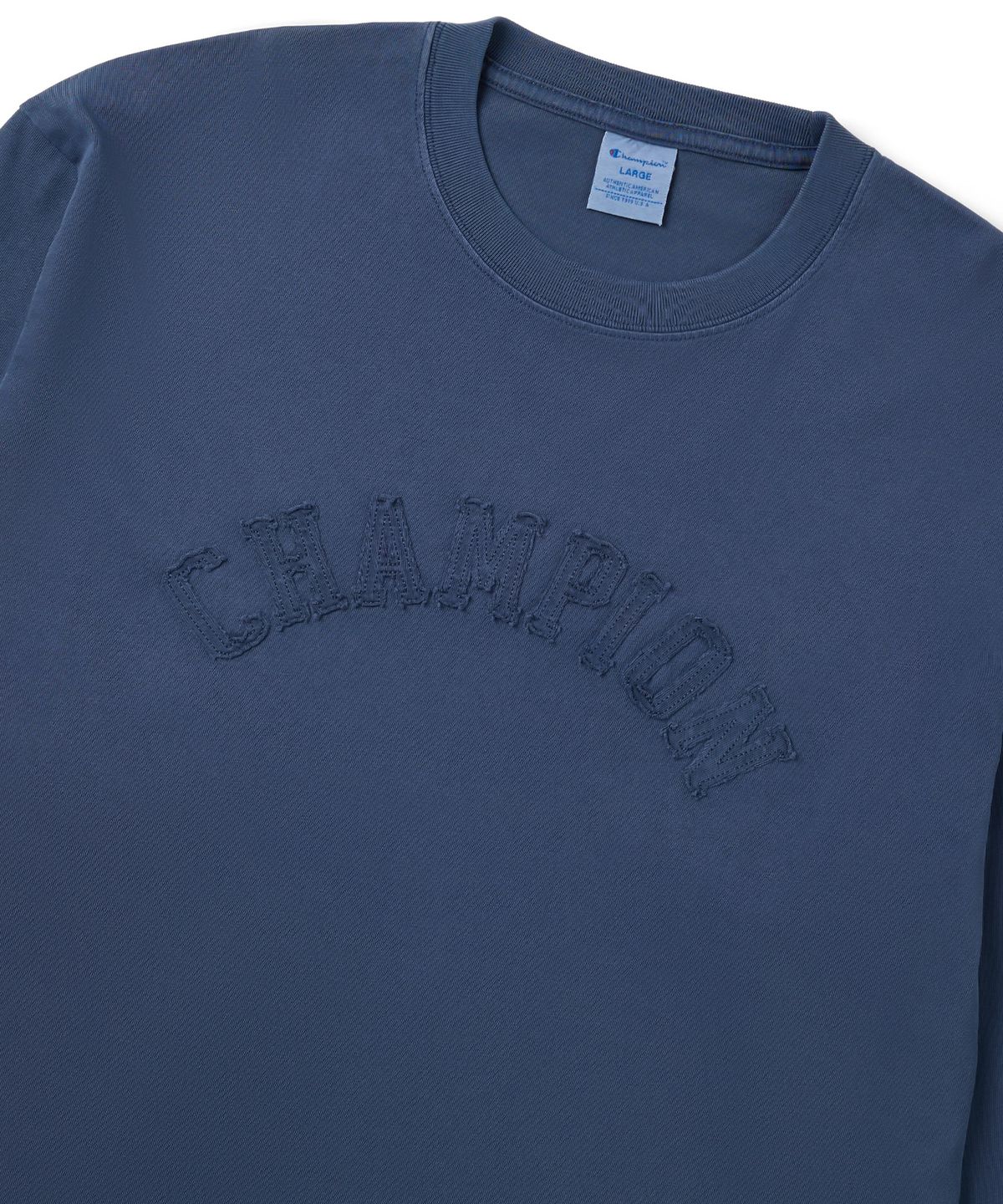 챔피온(CHAMPION) 아치 로고 루즈핏 아플리케 롱슬리브 티셔츠 Blue