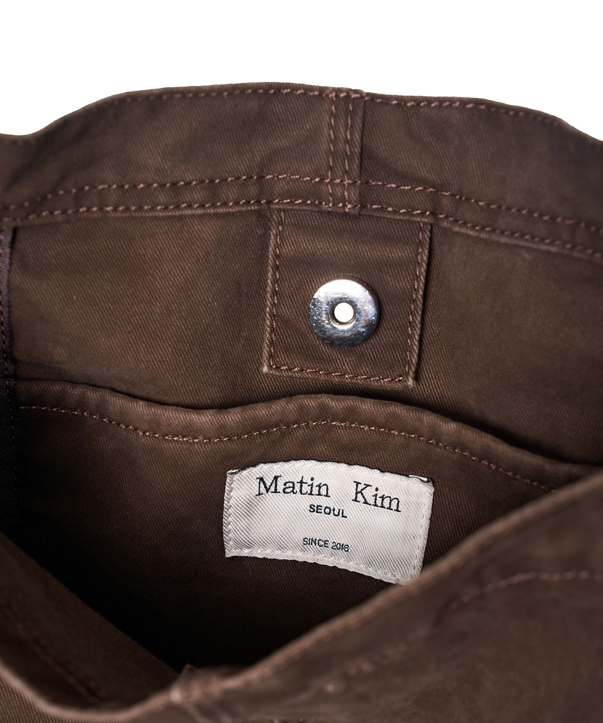 마뗑킴(MATIN KIM) VINTAGE WASHED COTTON SHOULDER BAG IN BROWN
