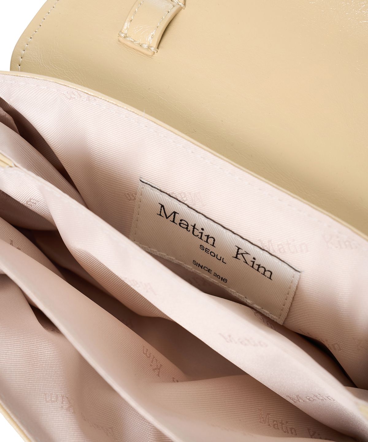 마뗑킴(MATIN KIM) MULTI-POCKET MINI CROSS BAG IN LIGHT YELLOW