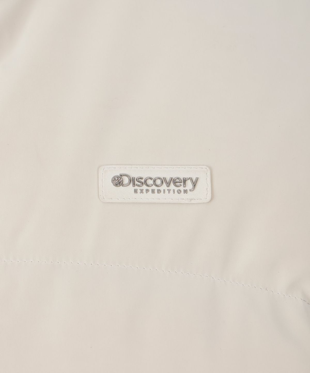 디스커버리 익스페디션(DISCOVERY EXPEDITION) 여성 헤이니 에어벨로 다운 숏패딩 (IVORY)