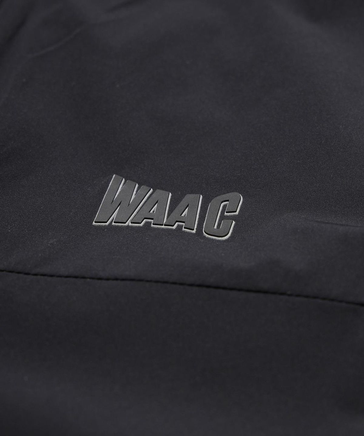 왁(WAAC) Men Essential Windbreaker WMUAM26200BKX
