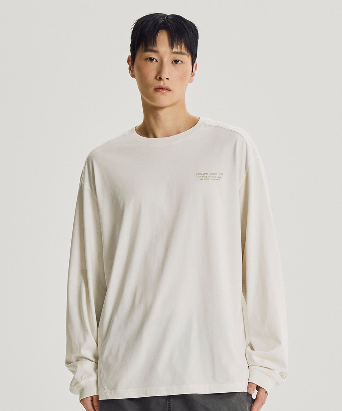 뉴발란스(NEW BALANCE) NBNDG31833 / UNI ESCAPE 다잉 긴팔티 (IVORY)