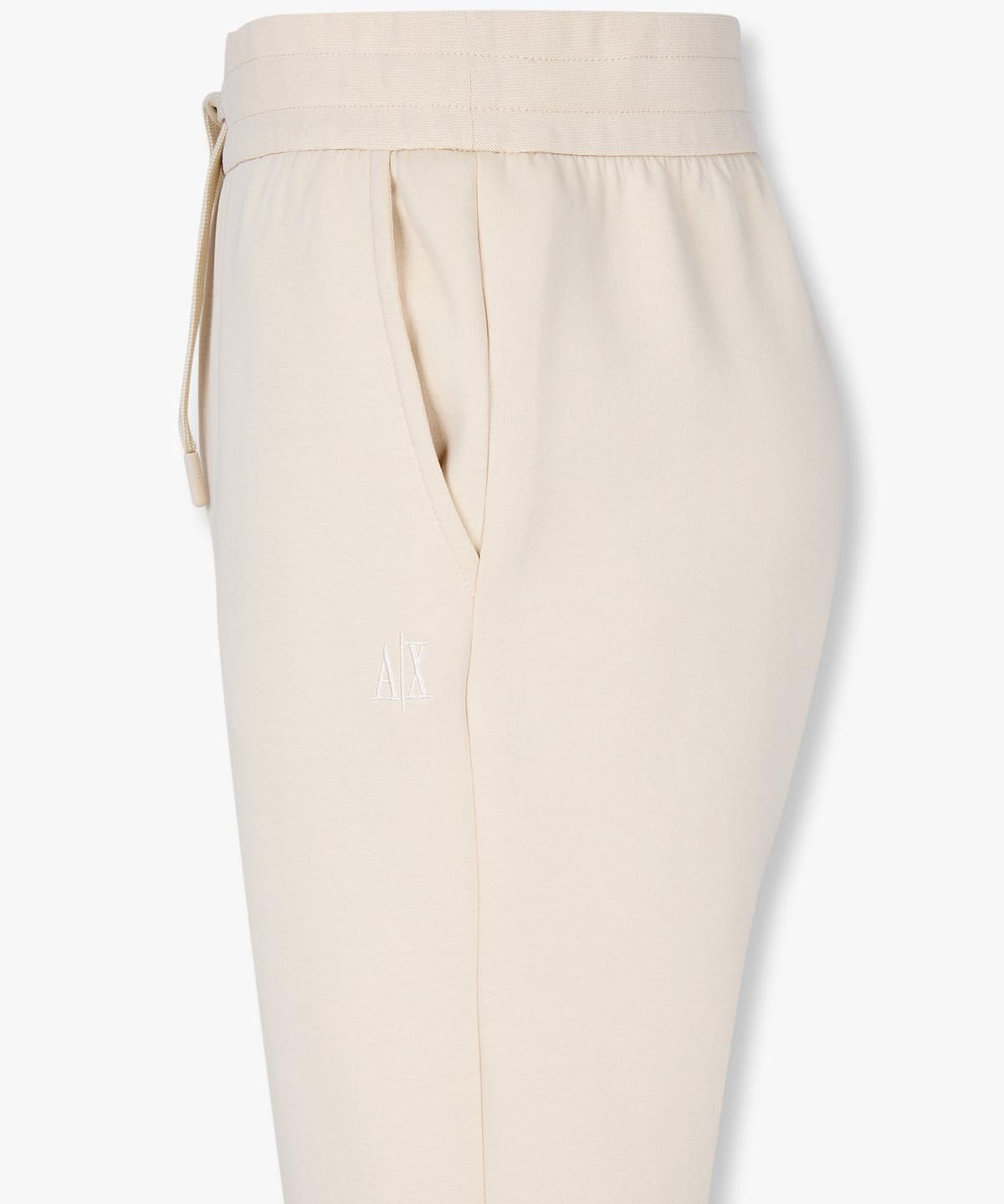 아르마니 익스체인지(ARMANI EXCHANGE) 여성 자수 로고 스트레치 조거 팬츠 _베이지_A425141513