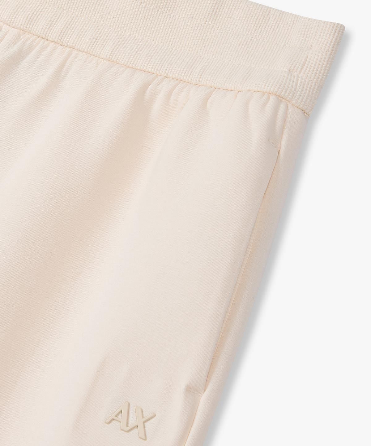 아르마니 익스체인지(ARMANI EXCHANGE) 여성 스트레치 코튼 트랙 팬츠 _라이트 베이지_A426141501