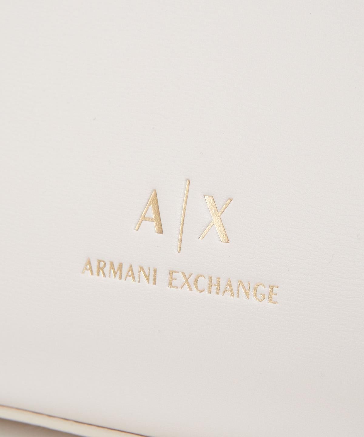 아르마니 익스체인지(ARMANI EXCHANGE) 여성 디보싱 로고 지퍼드 스몰 토트백 _오프 화이트_A425170509
