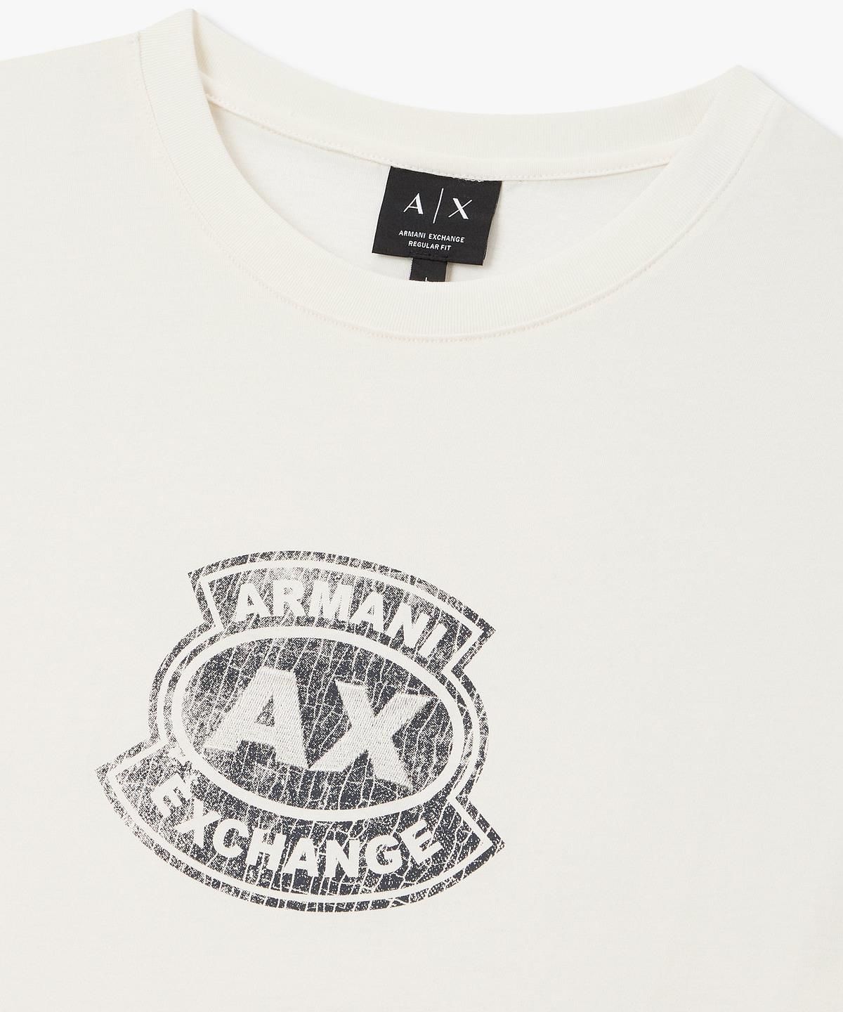아르마니 익스체인지(ARMANI EXCHANGE) 남성 빈티지 프린트 엠블럼 로고 티셔츠 _크림_A416130020
