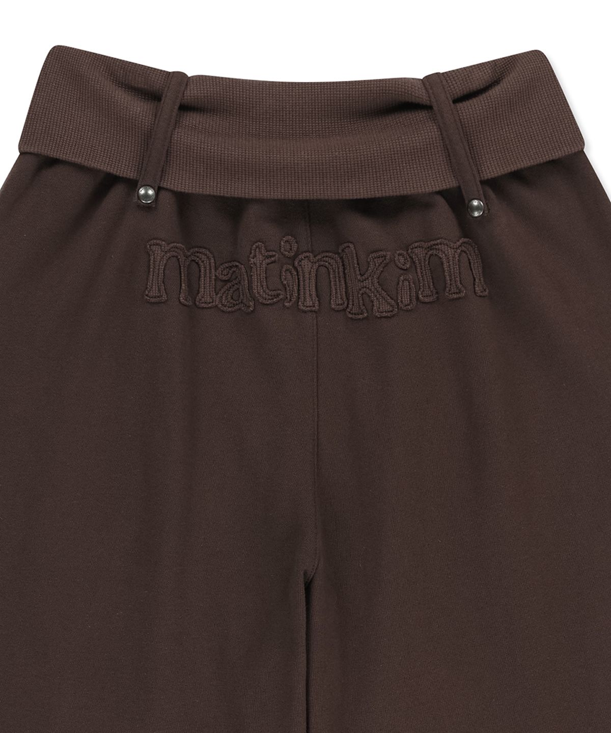마뗑킴(MATIN KIM) MIXED WAFFLE FOLDOVER WAIST JERSEY PANTS IN BROWN
