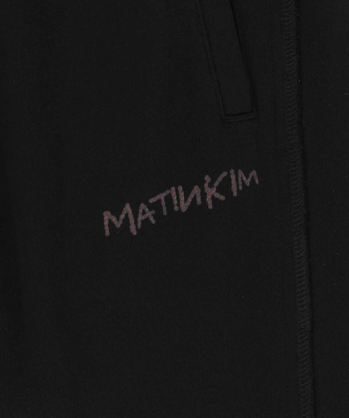 마뗑킴(MATIN KIM) VINTAGE WASHED COLOR CONTRAST SWEATPANTS IN BLACK