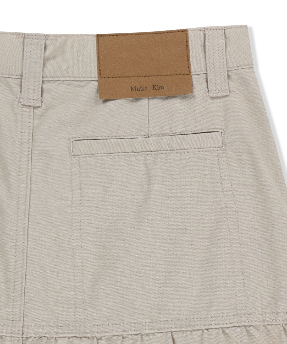 마뗑킴(MATIN KIM) VINTAGE POCKET MIDI SKIRT IN LIGHT BEIGE