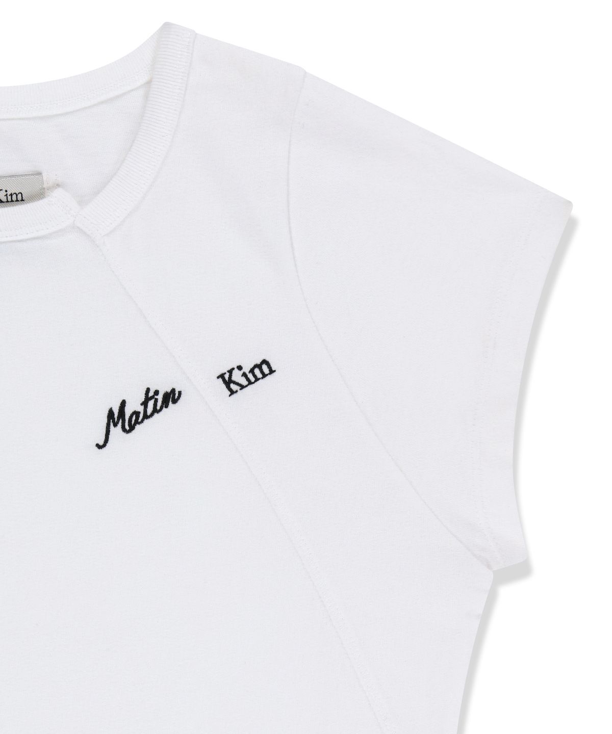 마뗑킴(MATIN KIM) CURVED CUT SLIM TOP IN IVORY