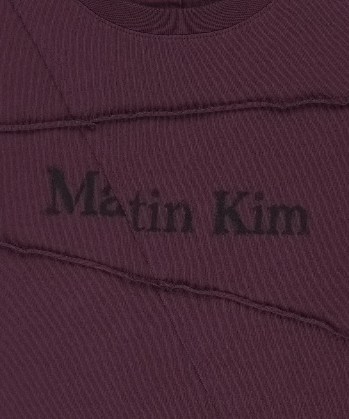 마뗑킴(MATIN KIM) DIAGONAL CUT LOGO CROP TOP IN PURPLE