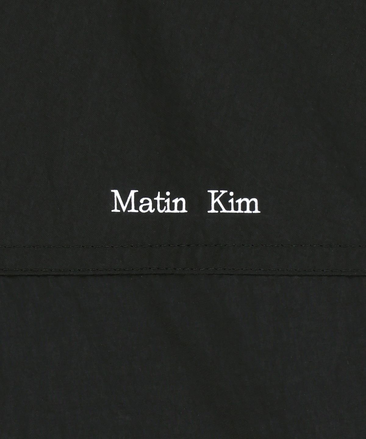 마뗑킴(MATIN KIM) CONTRAST TRIM TRACK ZIP UP IN BLACK