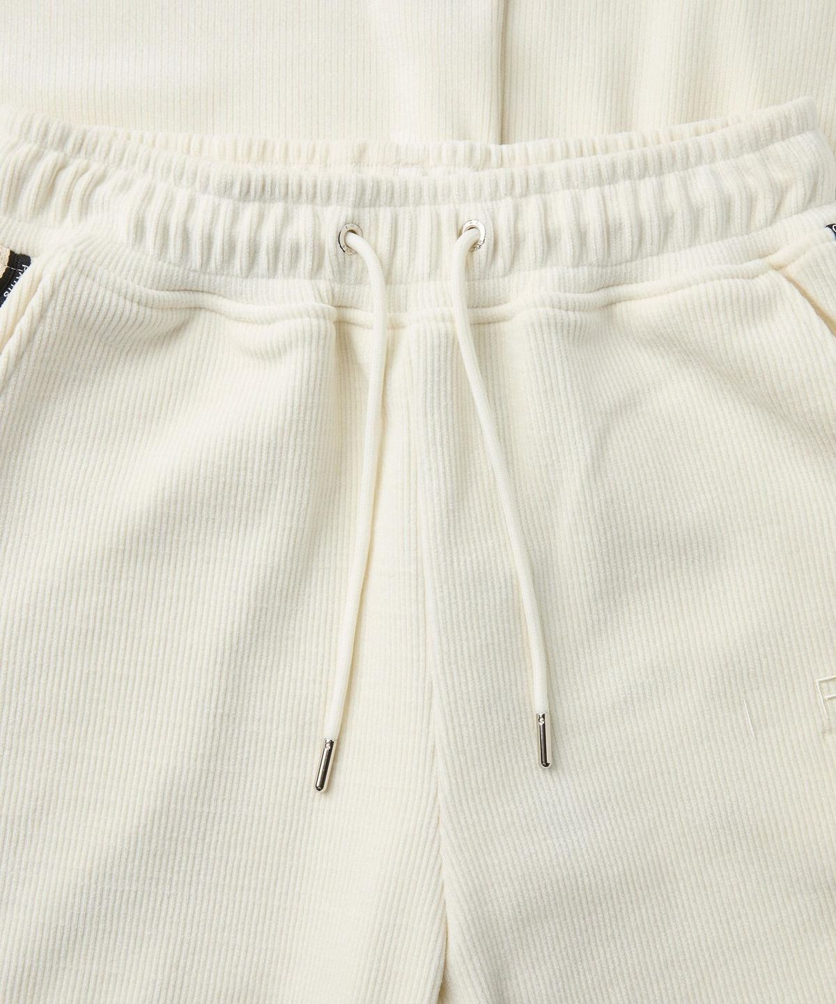 이로 우먼(IROWOMEN) Glaces 글로시 코듀로이 트랙 팬츠 ILPAA26724IVX