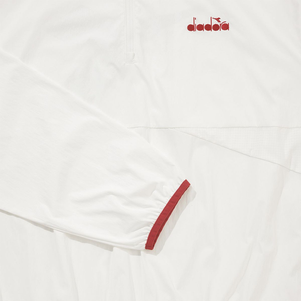 디아도라(diadora) 테니스타 하프집업 아노락 IVORY
