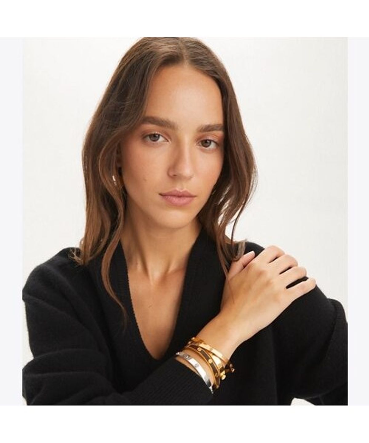 토리버치(TORYBURCH) 씬 아이콘 힌지 브레이슬릿 - 토리 실버