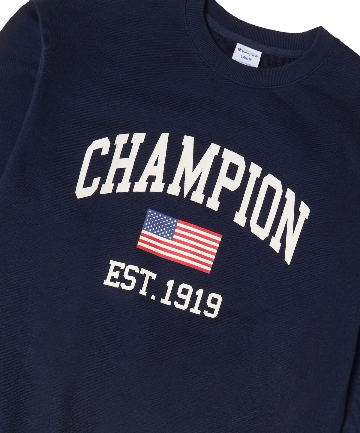 챔피온(CHAMPION) 플래그 아치 로고 오버핏 스웨트 셔츠 Navy