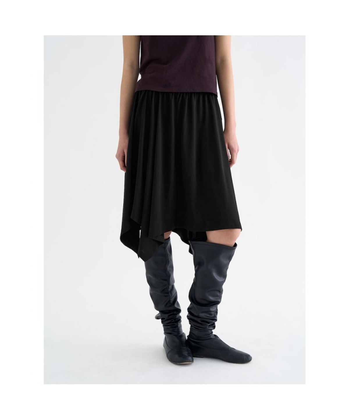 앙개(ANGGAE) Unbalanced Jersey Skirt  Black