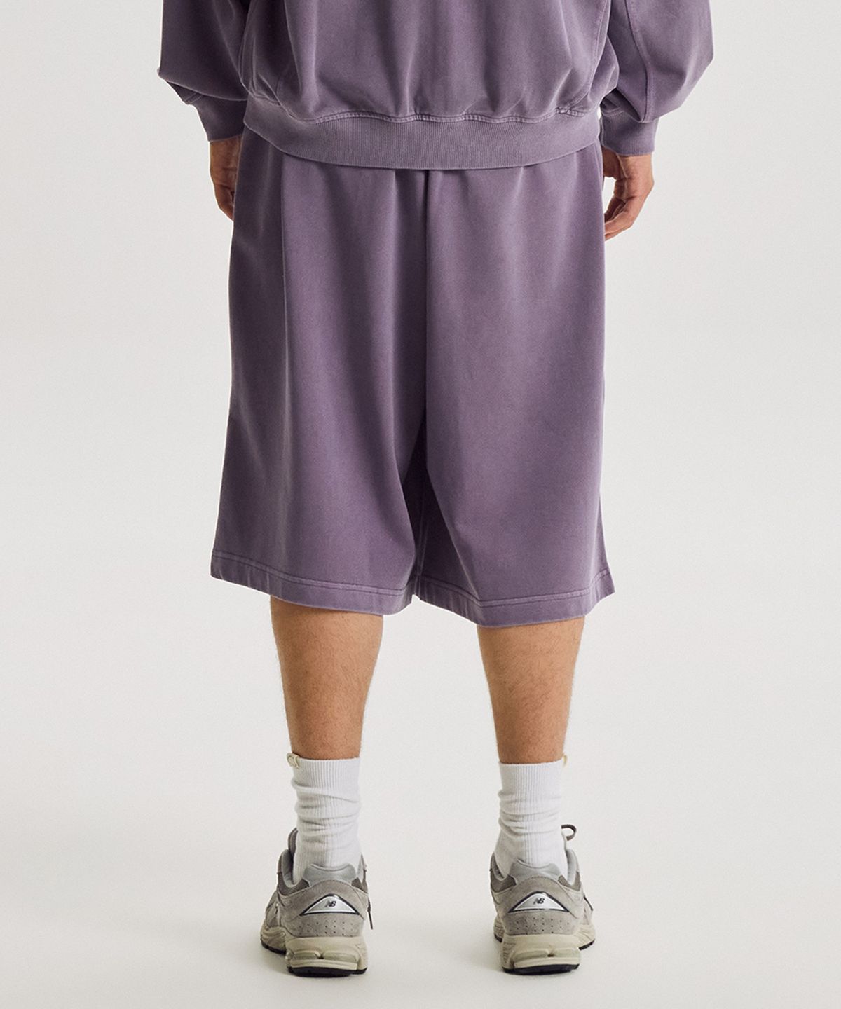 뉴발란스(NEW BALANCE) NBNVG31843 / UNI ESCAPE 8부 다잉 버뮤다 스웻쇼츠 (PURPLE)