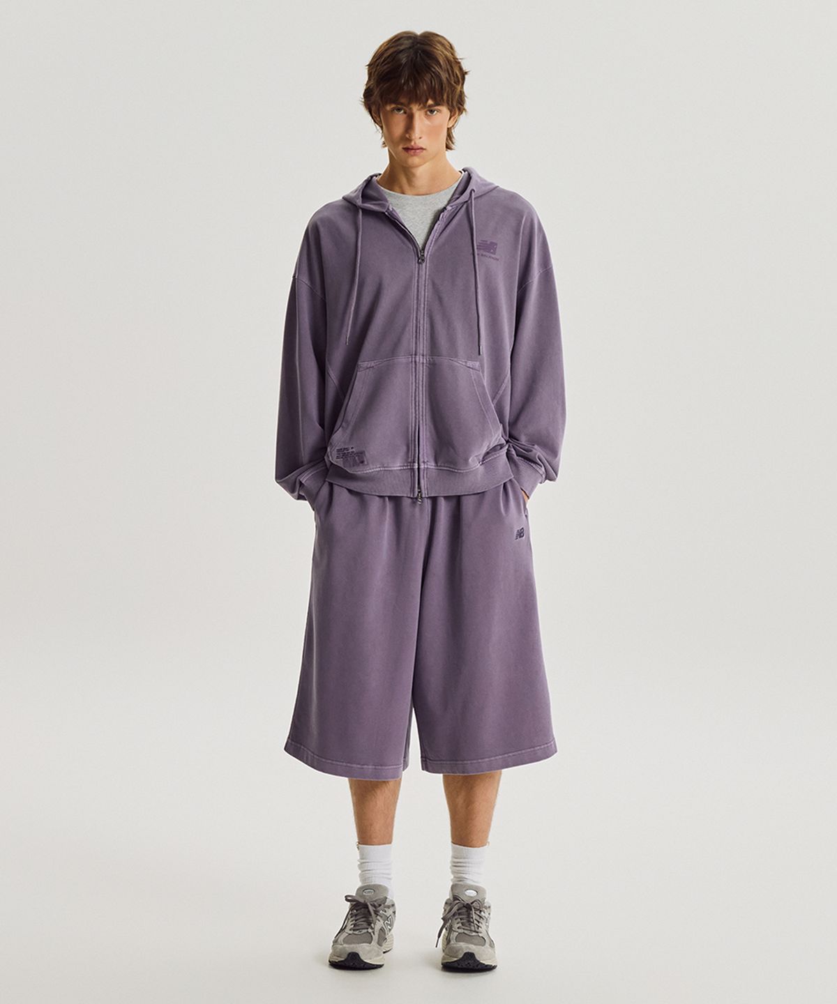 뉴발란스(NEW BALANCE) NBNVG31843 / UNI ESCAPE 8부 다잉 버뮤다 스웻쇼츠 (PURPLE)