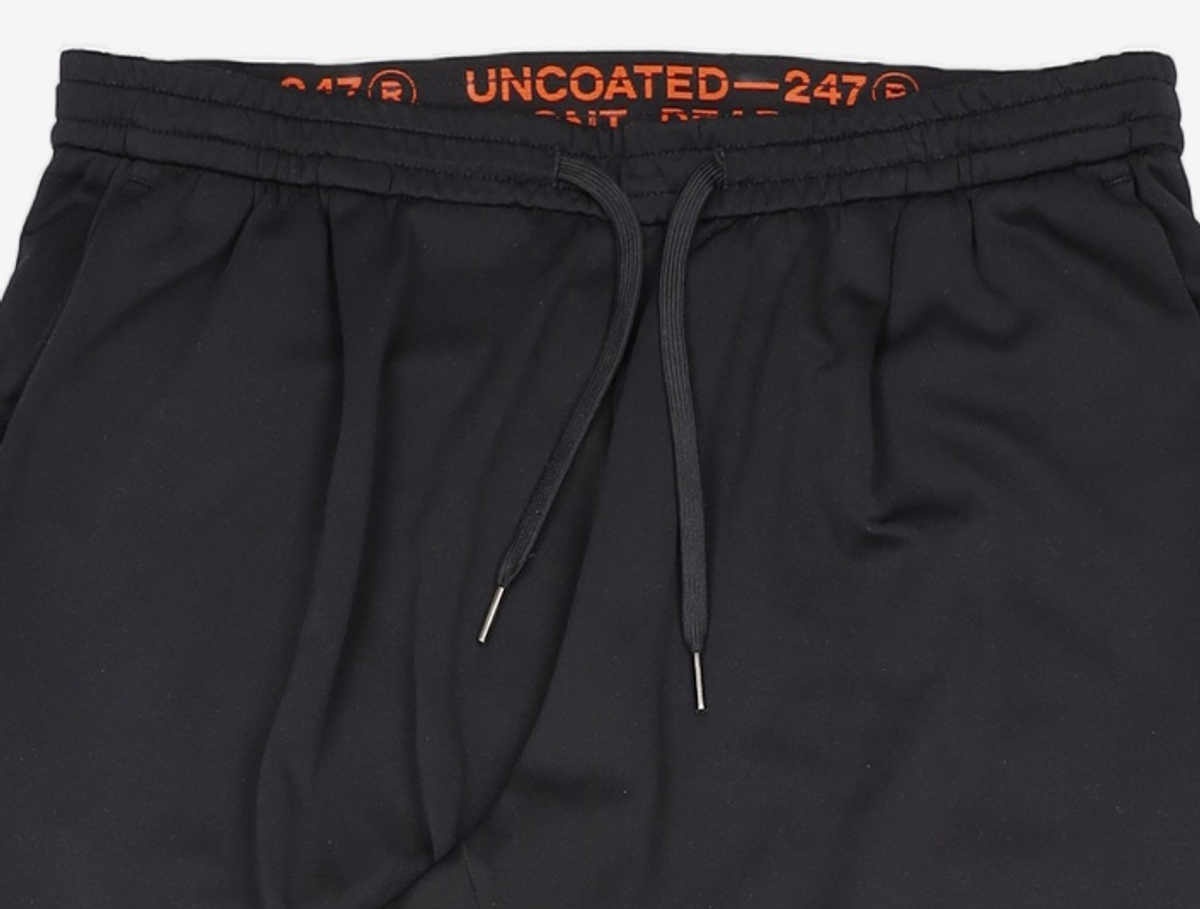 언코티드247(UNCOATED 247) 트레이닝 팬츠 L
