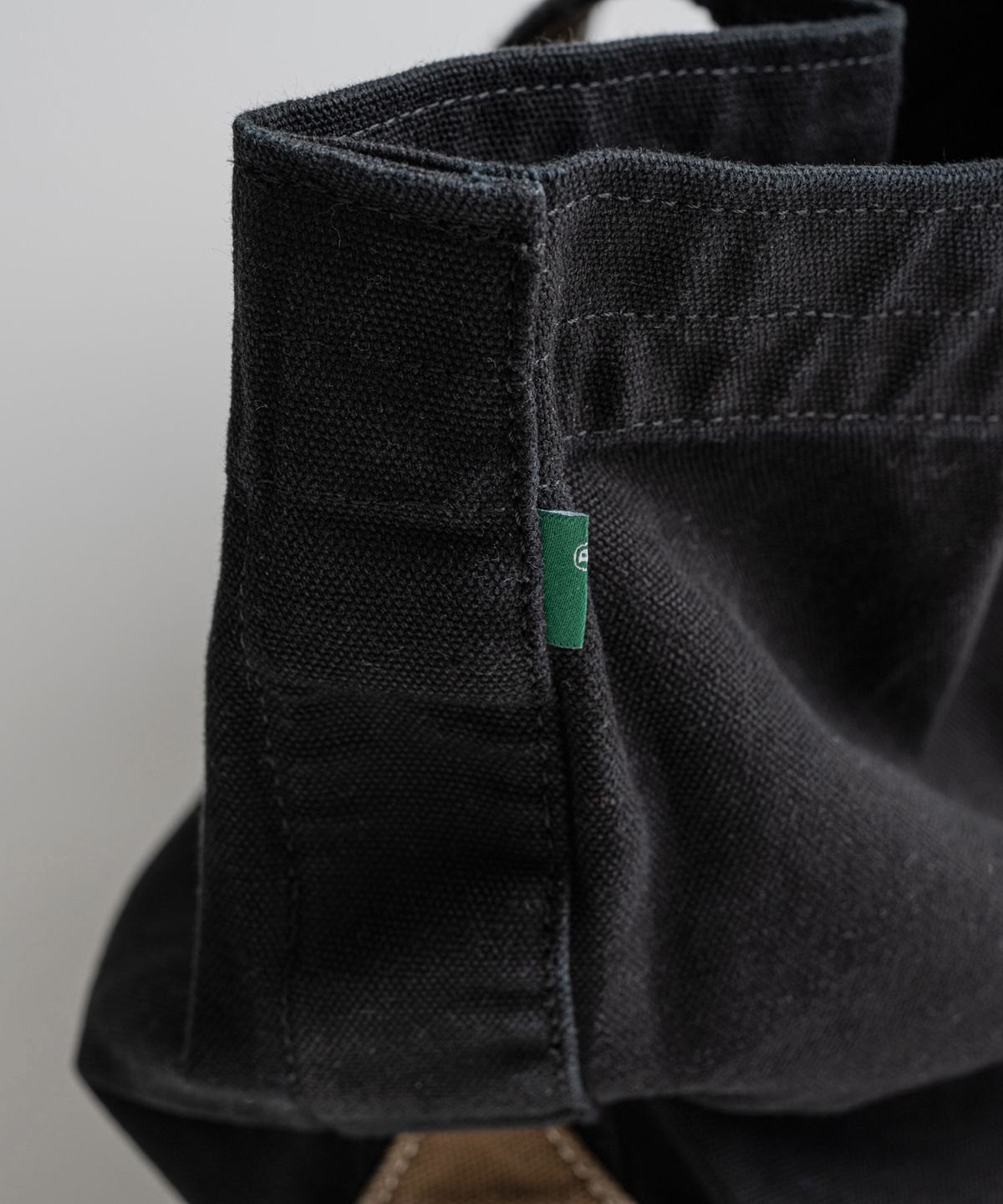 비헤비어(BEHEAVYER) WASHED CANVAS TOTE BAG black/brown